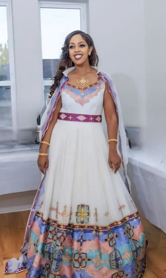 Magical Multicolored Ethiopian Wedding Attire: Intricately Handmade Matching Habesha Couples Outfit